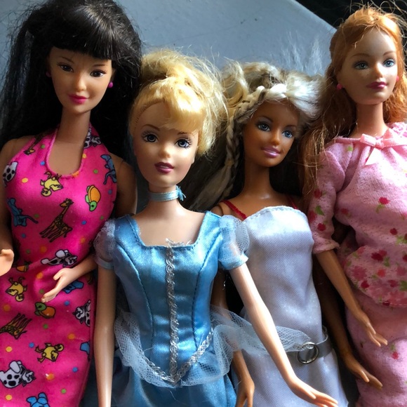 A set of 12 inch Barbie and Disney dolls